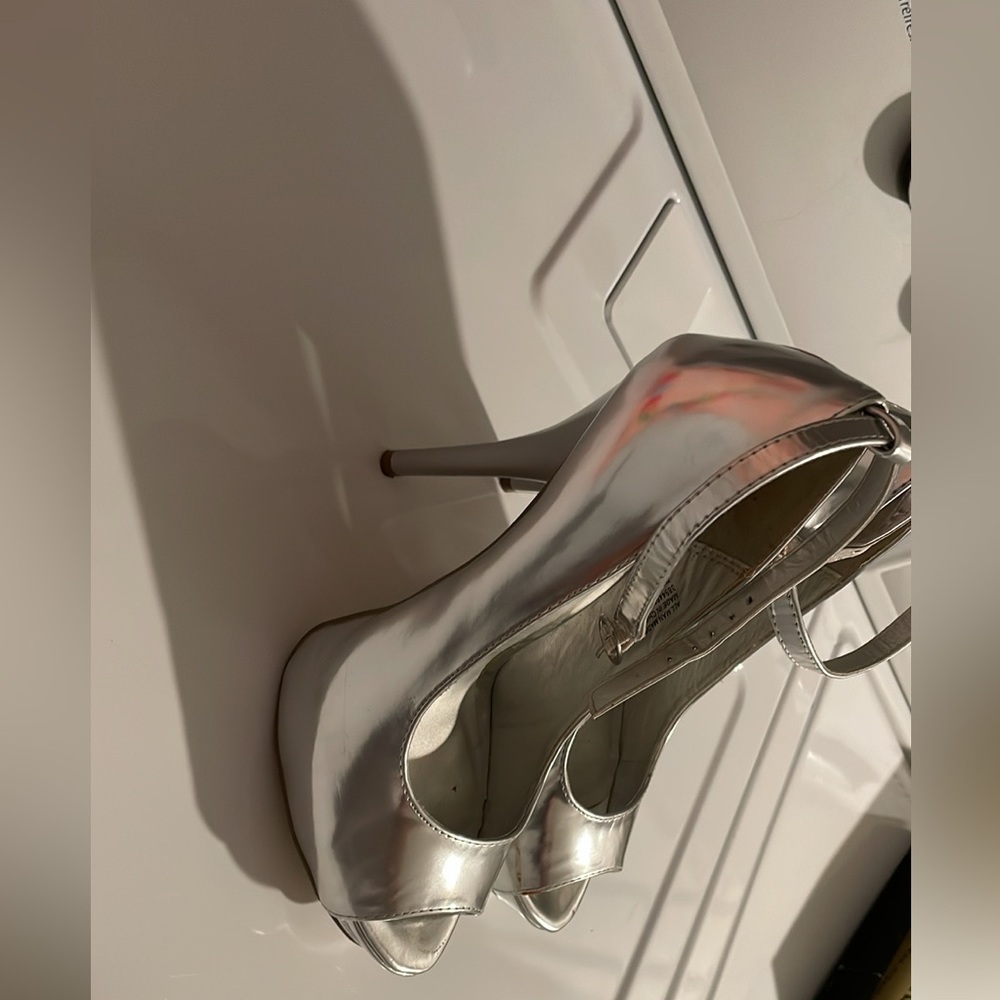 Diba silver high heels, size 7.